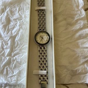 Pierre Balmain Paris Wrist Watch in Silver color with dark blue outer rim color